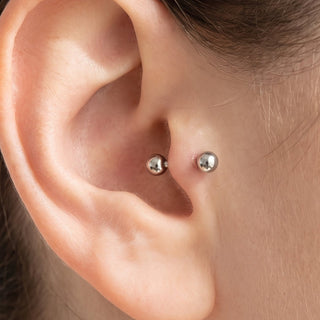 Silver Tragus Piercing – selection on linen