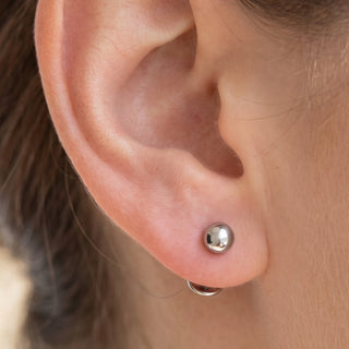 Silver Ear Piercing – selection on linen